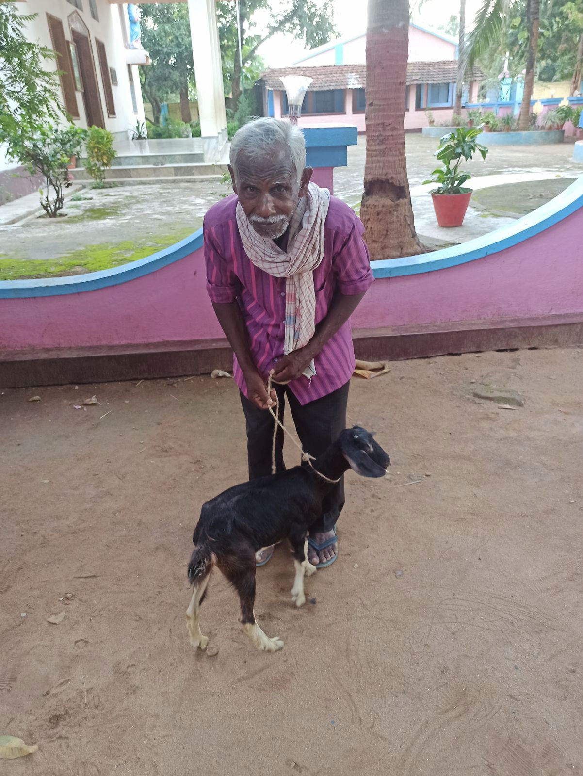 Villager with donated goat