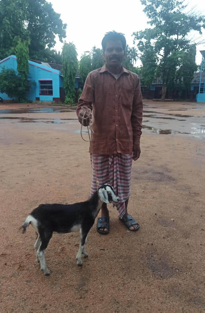 Villager with donated goat