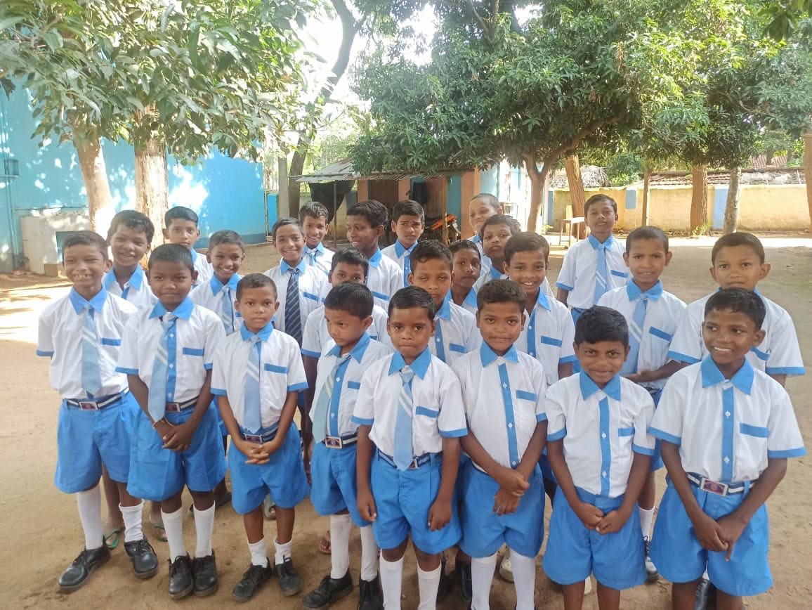 Young children with new uniforms
